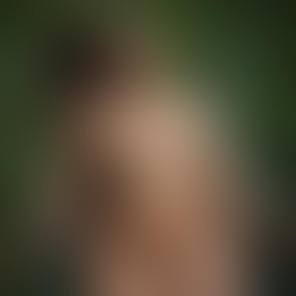 A striking composition showcasing diverse bodies in artistic nude photography, blending candid moments with themes of body positivity. Capture the essence of vulnerability and empowerment with soft, natural lighting highlighting the contours and textures of the skin. Incorporate diverse ethnicities and body types, celebrating individuality. Use elements of nature, such as lush greenery or flowing water, to symbolize growth and acceptance. super-realistic. soft colors. warm lighting.